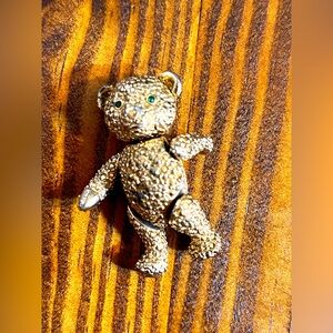 Vintage Gold tone jointed Teddy Bear Brooch Jewelry with green eyes 1.75 inches